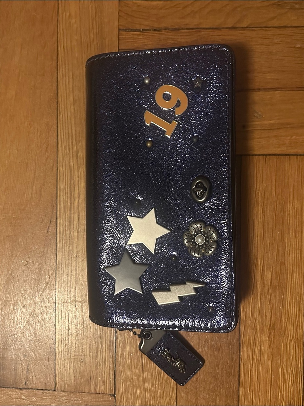 Coach ReLoved Dinky bag
Star & Number Studs - Navy crinkle leather